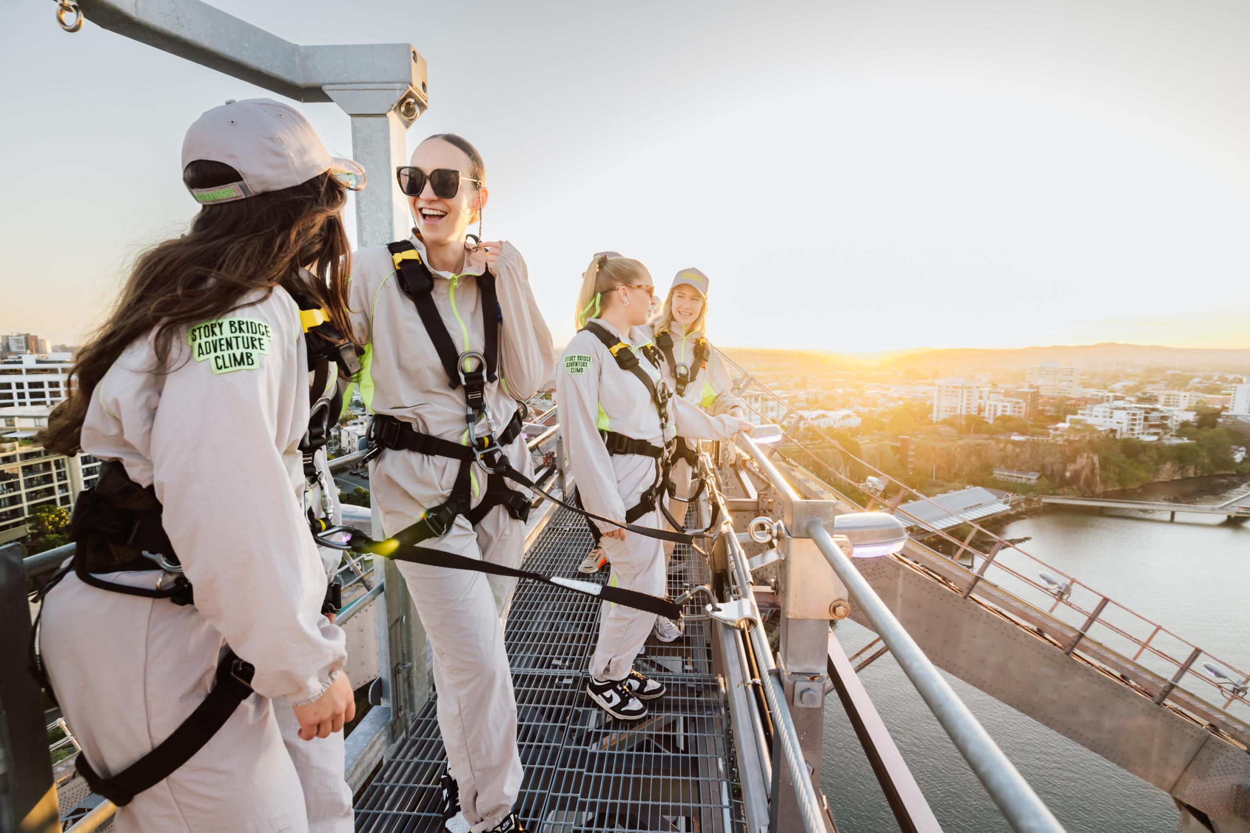 Dawn Climb at Story Bridge Adventure Climb with golden sunrise light over Brisbane